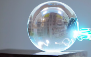 A crystal ball with an electric cable